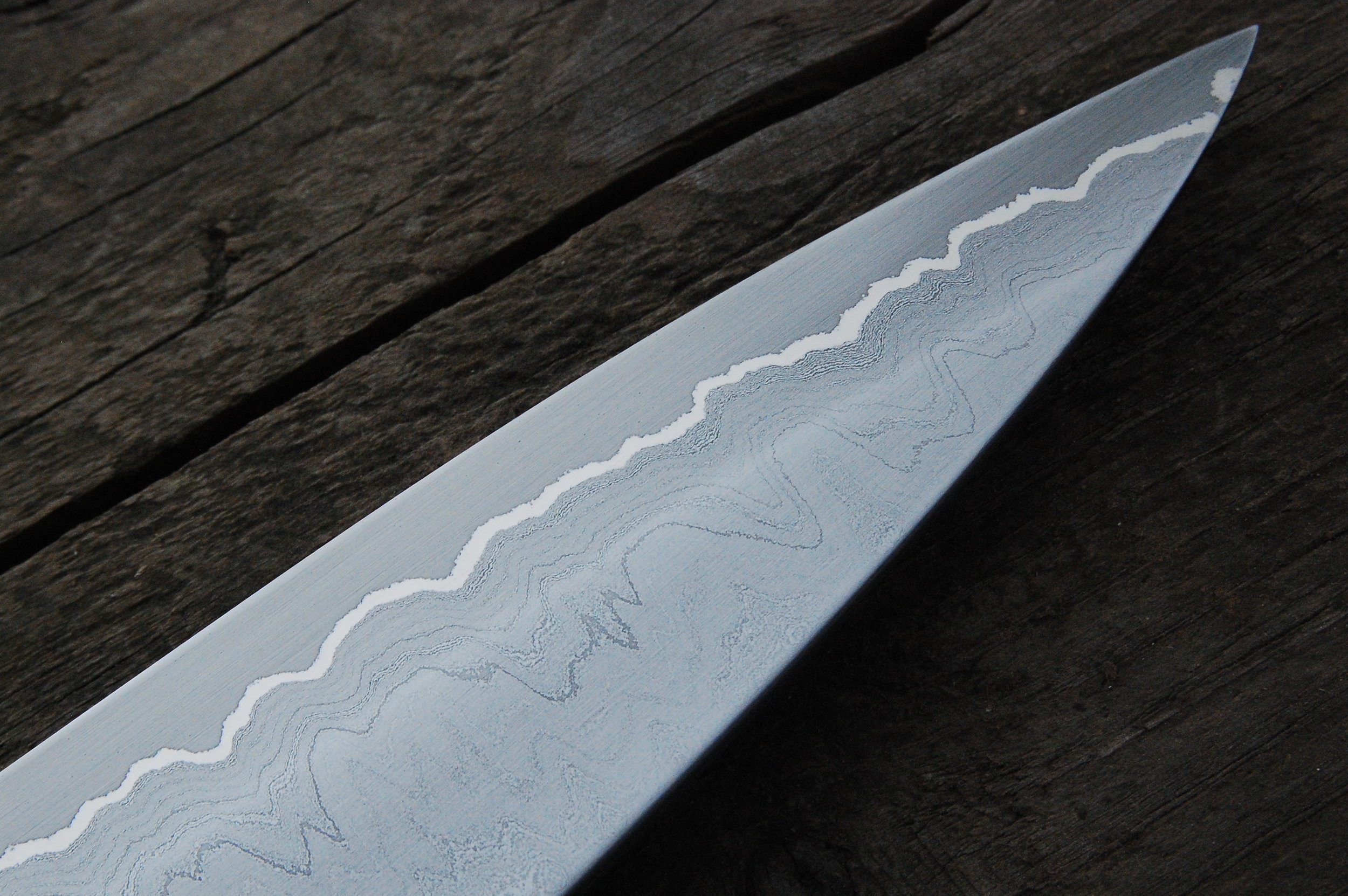 The core steel, 52100 high carbon is laminated with a jacket totaling 750 layers creating a super fine damascus pattern. This will be available for sale.