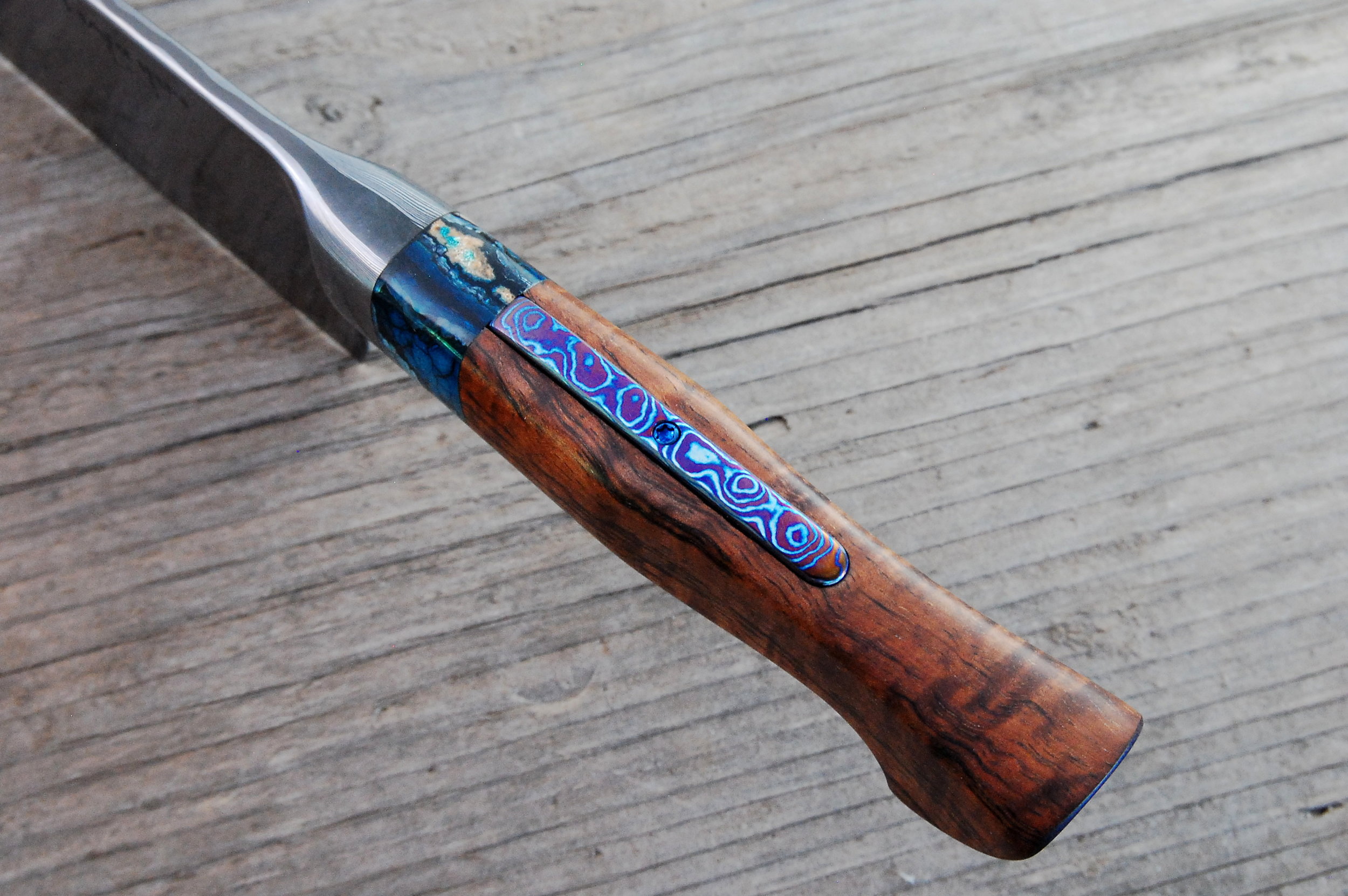 Mammoth tooth koa, and Timascus inlay.