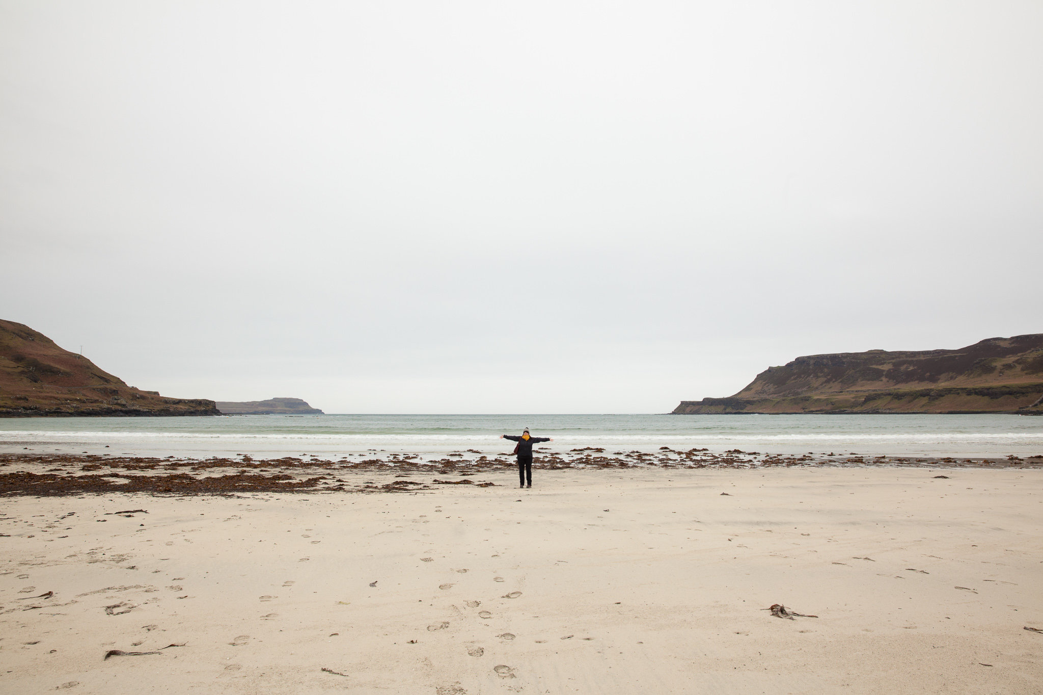 Calgary Bay...and me...showing it to you. Normally it's quite tropical looking and bright blue, but it was blustery & cold the day we came! (Hmm....kinda like another Calgary I know).