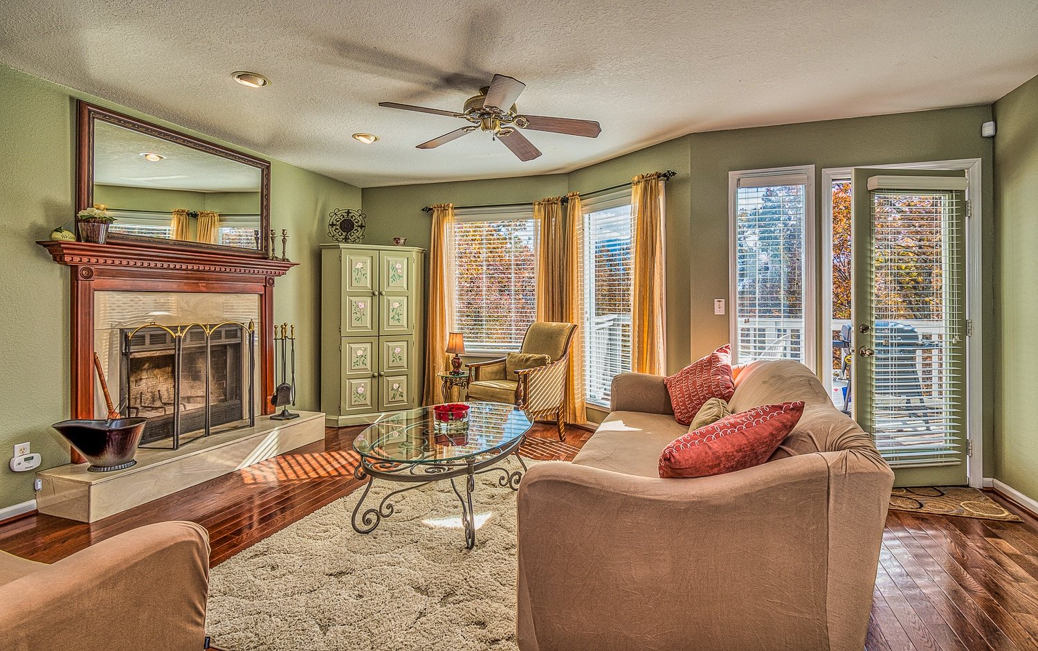 family living room with fire place large windows