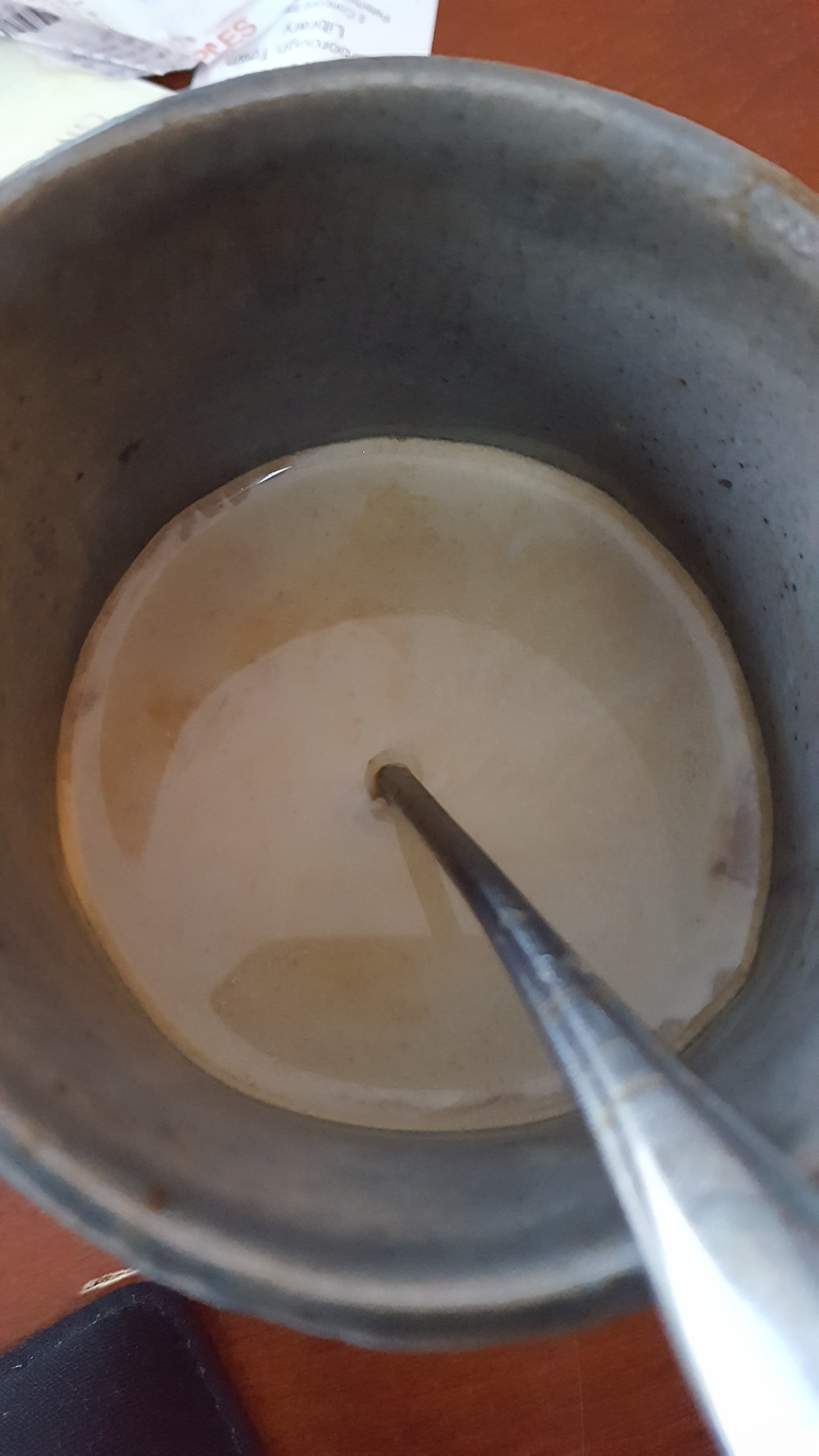 Curdled Creamer laying on top, yuck!