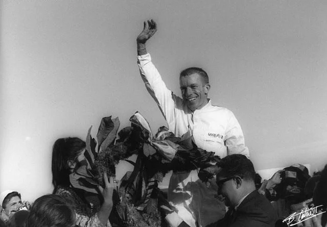 Ginther at the 1965 Mexico Grand Prix, winning his only F1 race, and the first for Honda