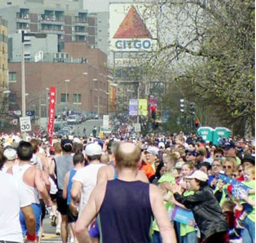 The iconic Citgo sign helps to mark the direction of the finish line.