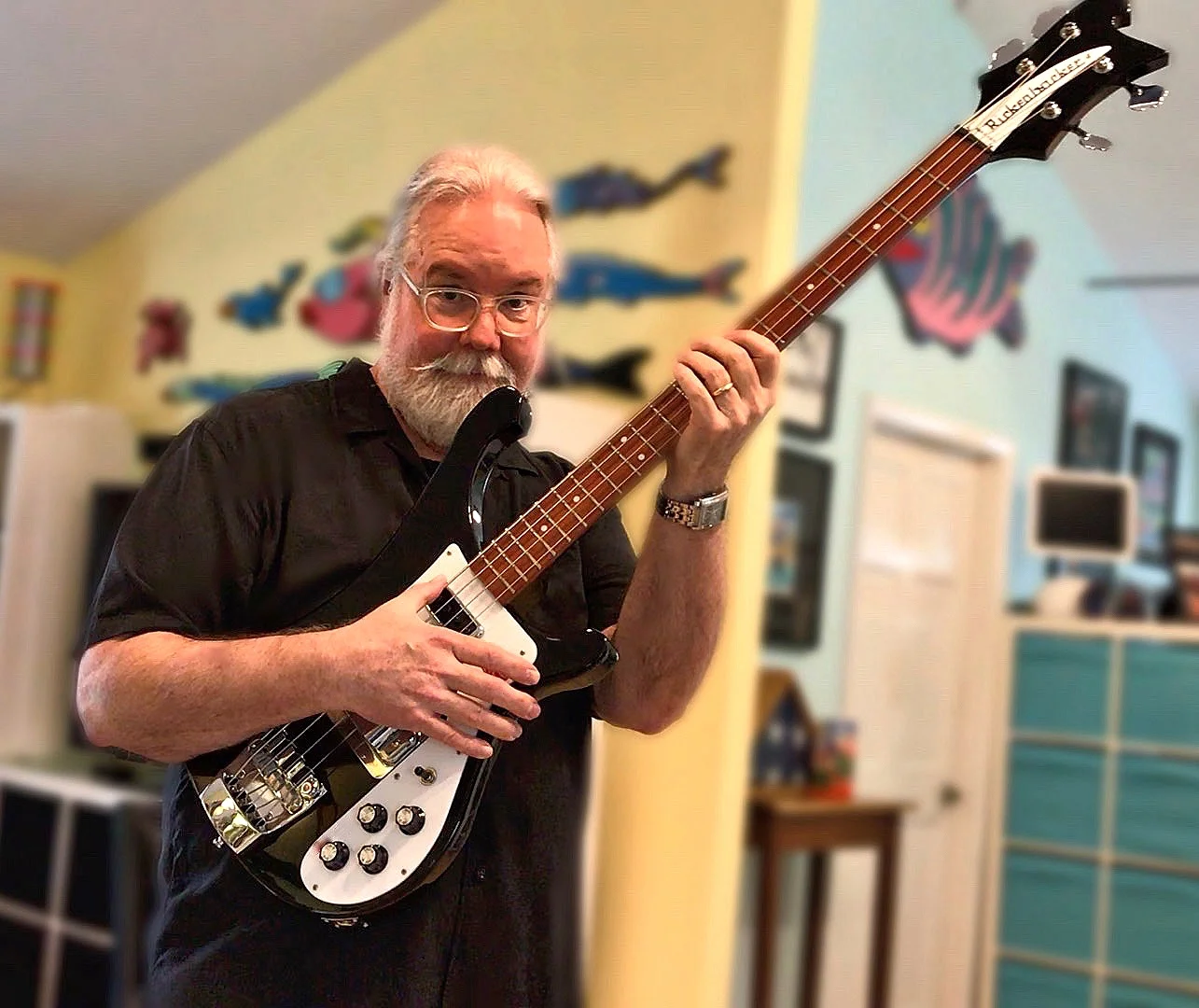 When he’s not drawing or designing, Norris is rattling the windows with his bass guitar (much to the delight of the neighbors).