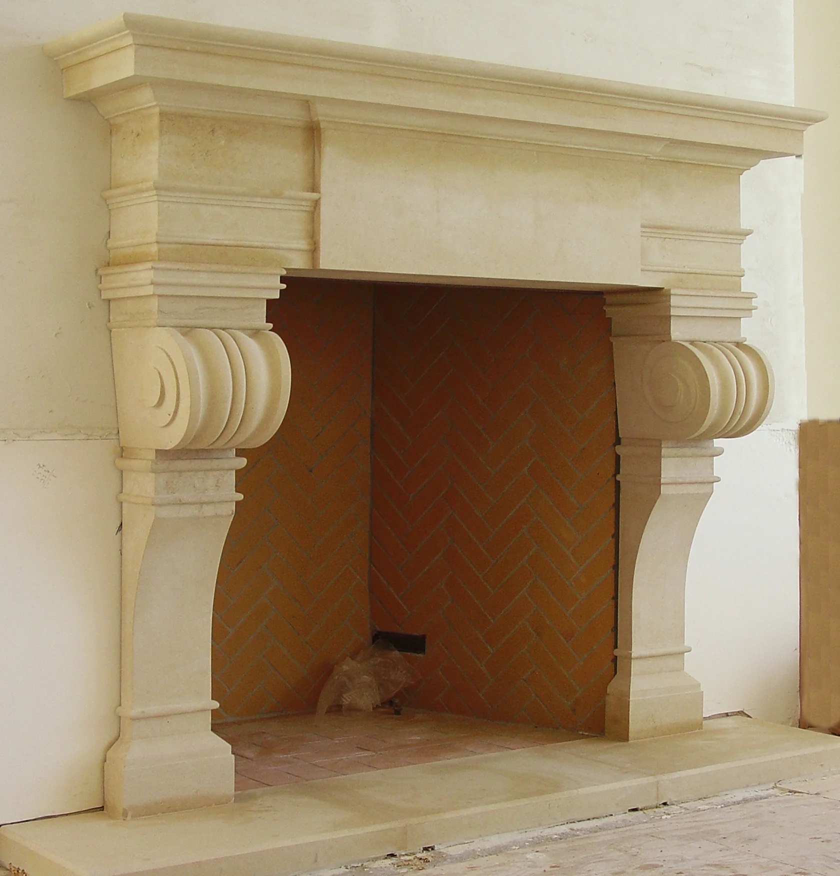 fireplace surround in limestone