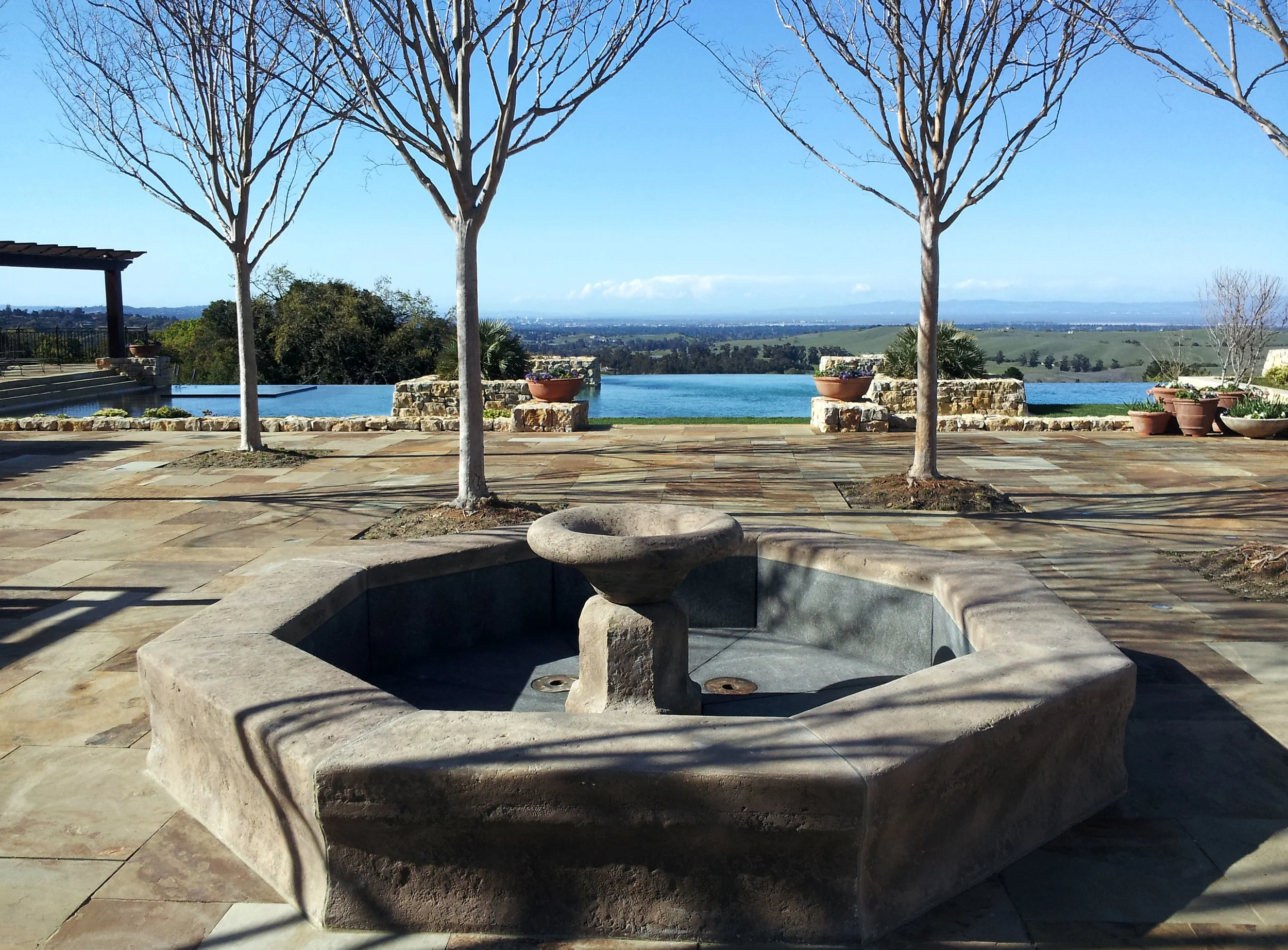 fountain in limestone with granite basin
