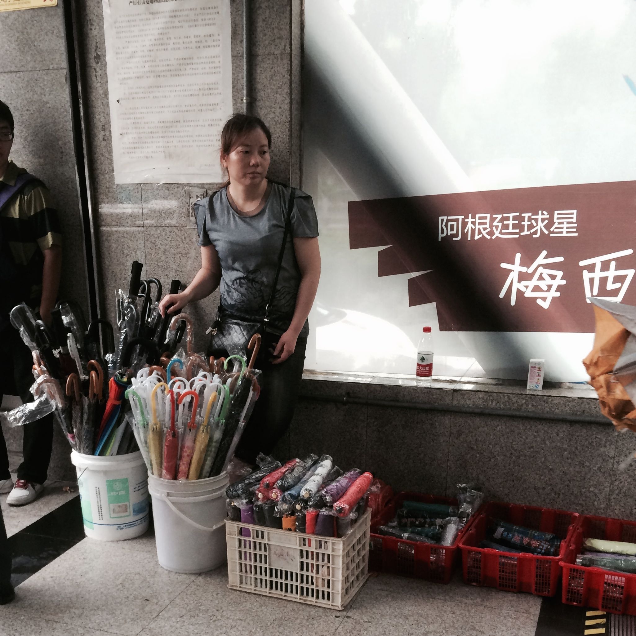 Umbrella Seller in Shanghai Subway Exit