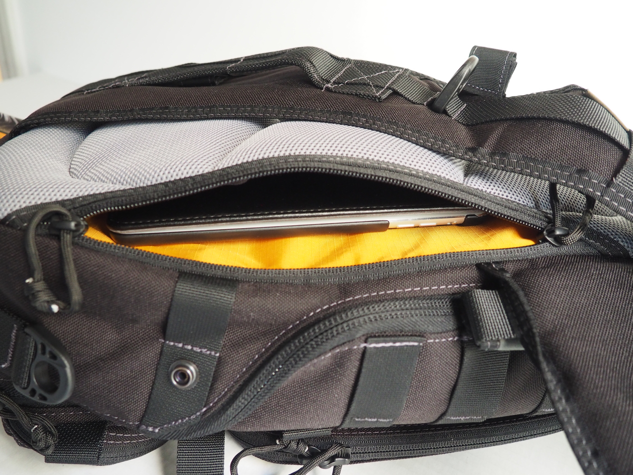 Concealed back pocket, good for an iPad Air