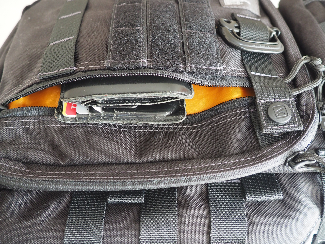 Wallet in the front zip pocket, "lockable"