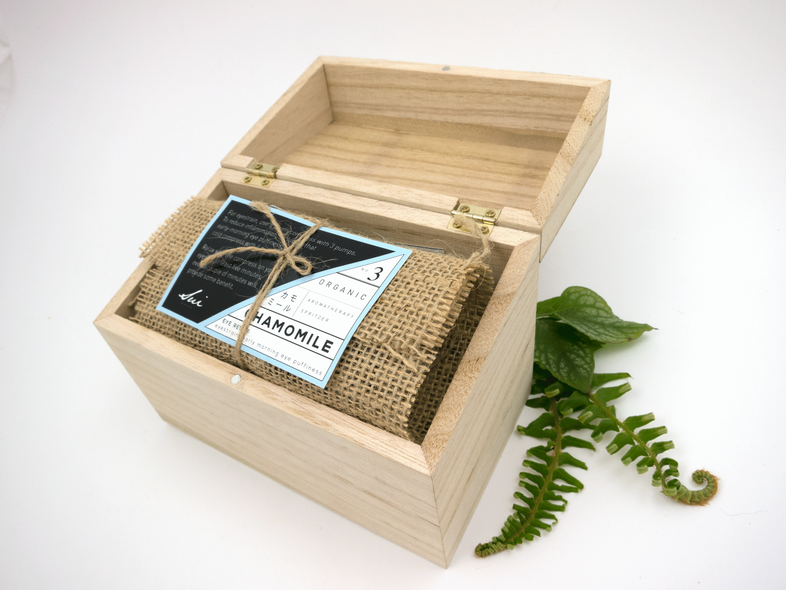 Inside: Burlap is wrapped around eye mask for people who might want to use this while sleeping. Direction is matching the bottle to unify objects.