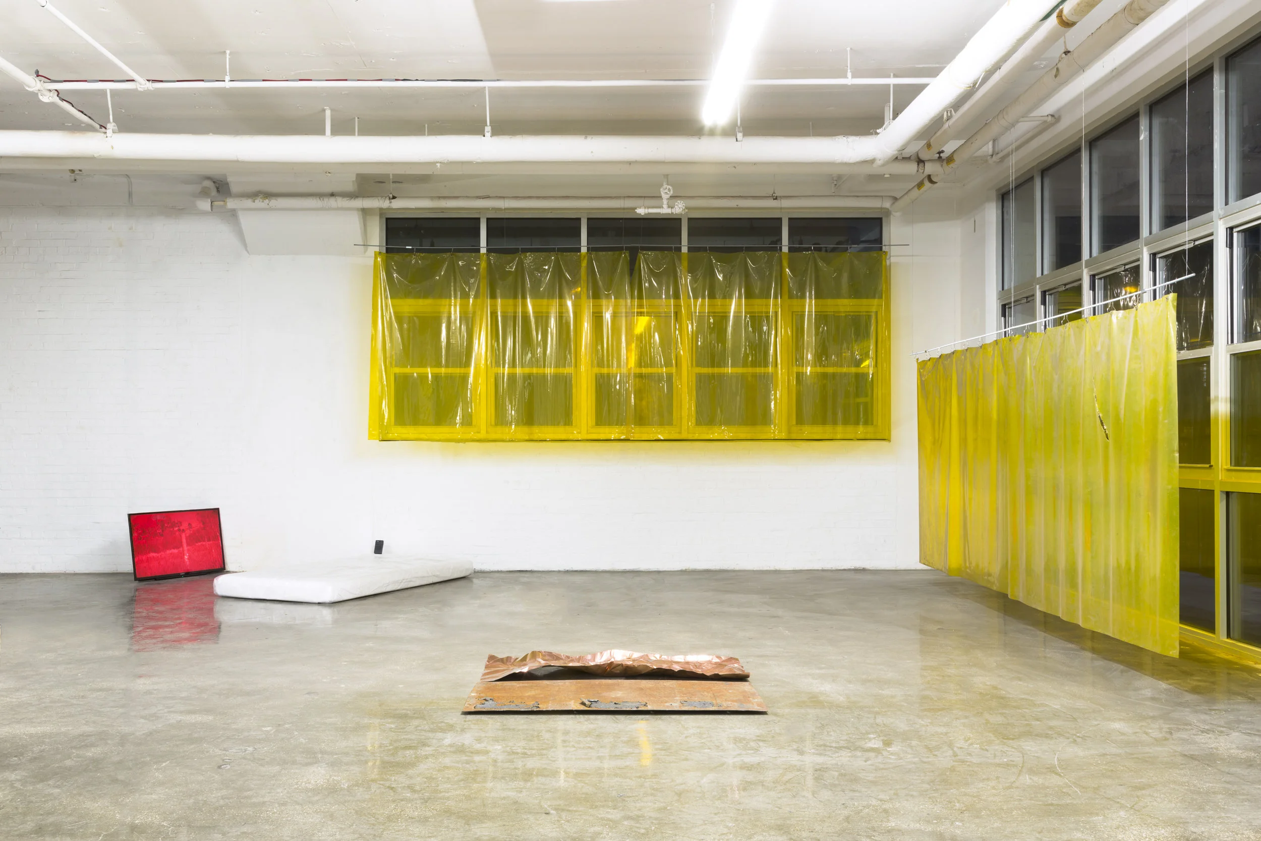 Hanging out 2018 Works in collaboration with Kristine Eudey Video, foam, plastic sheeting, radio, PVC welding curtains, slept-on copper, vinegar, found steel