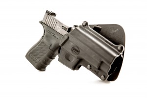 The $500 dollar gun in a $15 dollar holster. I hope you have spent the time and money to select your gear wisely. This holster and gun will be ripped off the body in seconds if someone gets their hands on it. You get what you pay for!