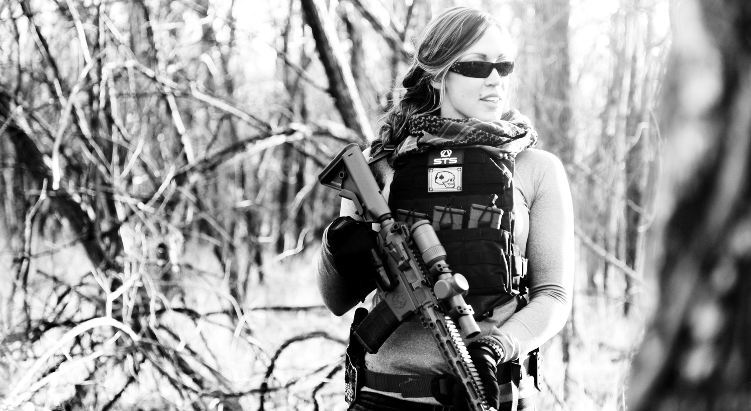 Brittany Paus with the SFA-15 RDR (Reduced Recoil Rifle) TAG vest.