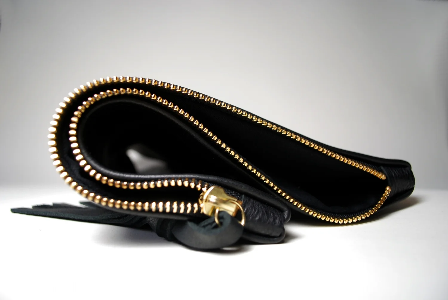 black leather fold.jpeg