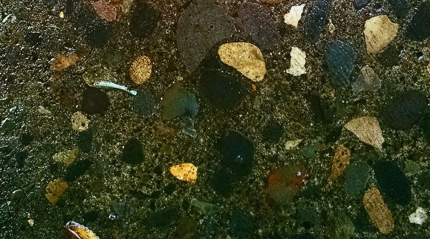 Be up close and personal with concrete to see the rocks that are in the mix.