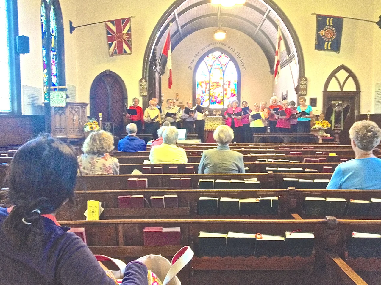 The Admiral at the Songs of 1914 concert. St Luke's was established under Royal Charter by George III, and exhibits a handwritten note by George V (who signs George RI, or Rex Imperator ). The Empire is gone, but the Anglican Church of Canada remains.