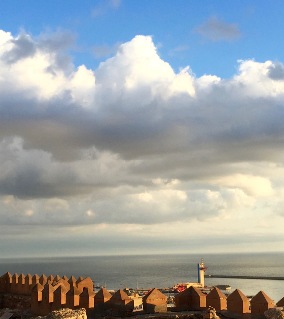 The tiny white mast in the very center of the picture is Peregrinus at anchor, as seen from the Alcazaba. iPhone 6 Plus.