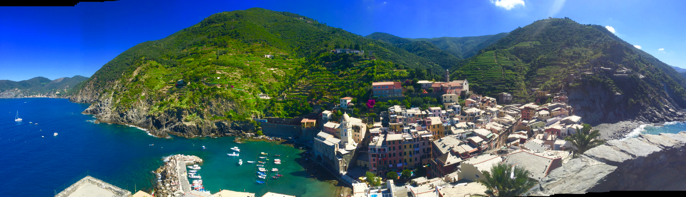 Peregrinus lies on a mooring buoy, slightly to the left, off-camera. Photo taken from the 15th-century Doria Castle, an enlargement of the pre-existing fortress. 17 July, iPhone 6 Plus.