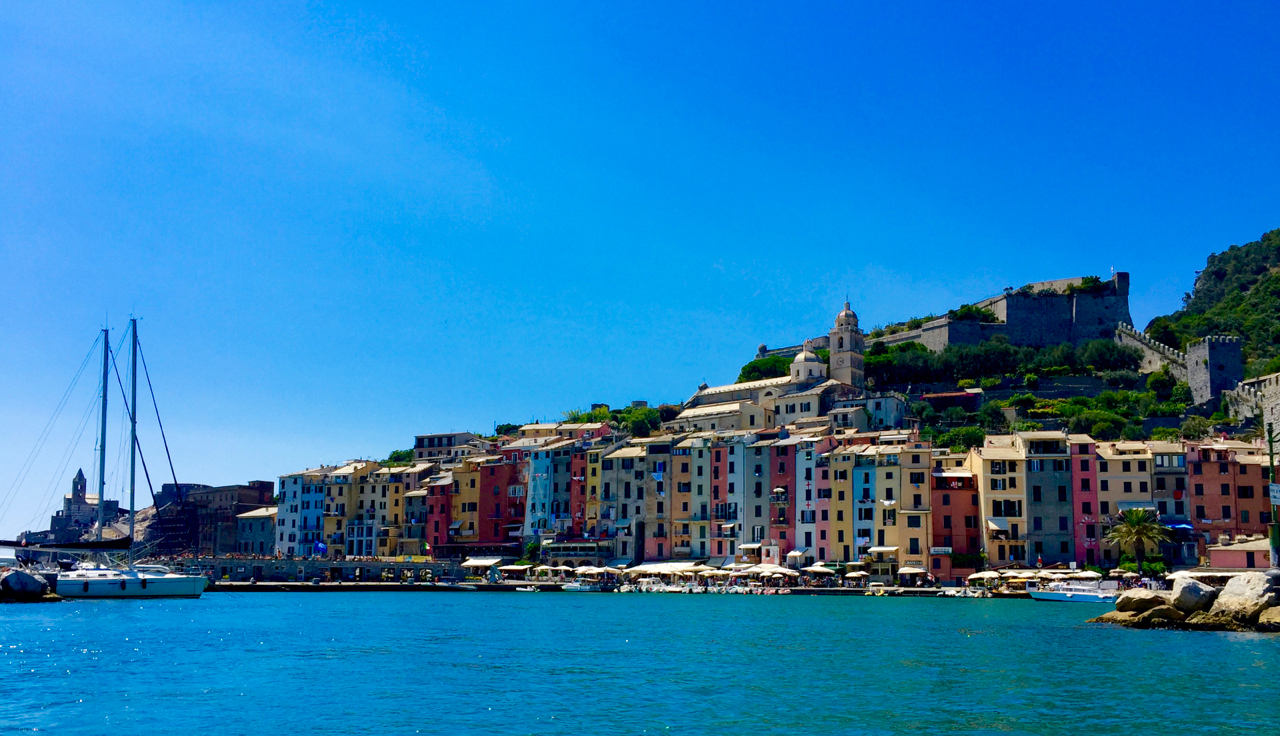 See the wall encircling the town? The houses on the waterfront were laid as homes, but designed to function as city wall when the Republic of Genoa took over the city in 1139. July 19, 2016, iPhone 6 Plus.