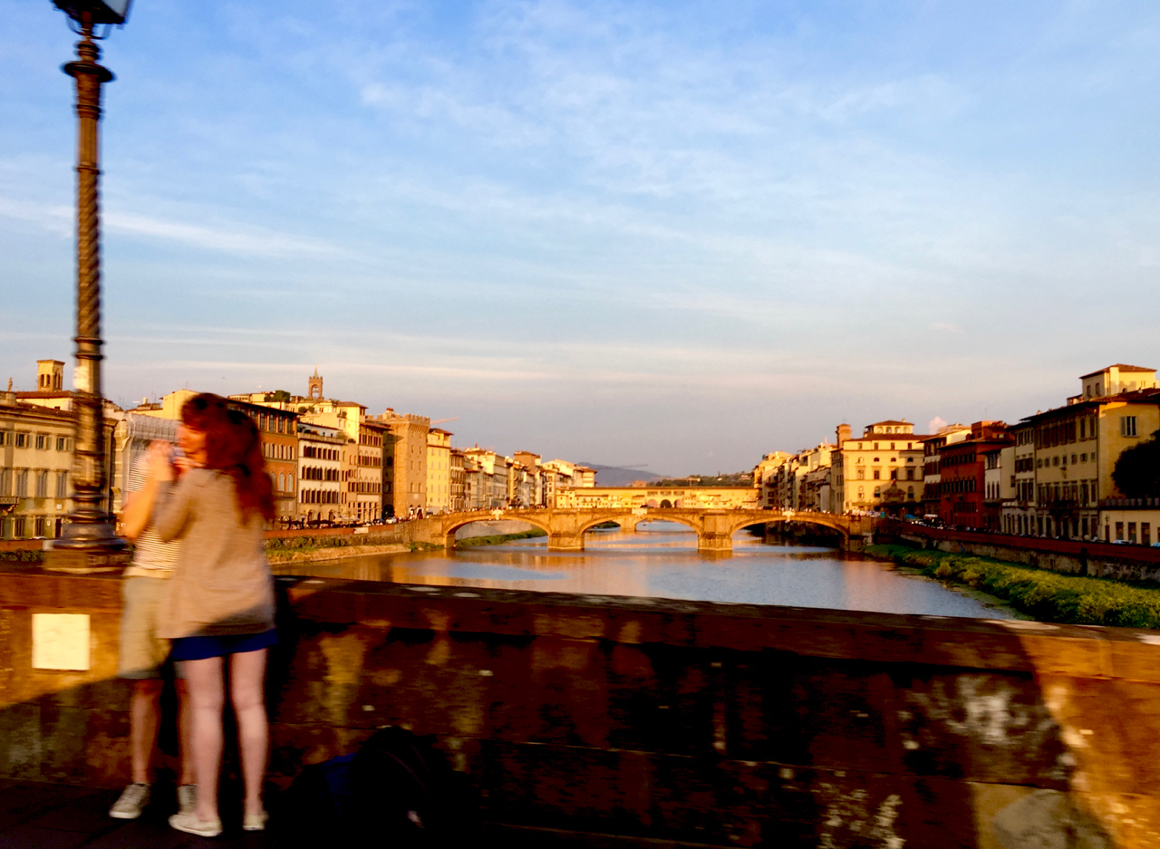 Upriver from the Alla Carraia bridge (1218): the Santa Trinita bridge (1252), and beyond, the Ponte Vecchio (A.D. 50 ?). The crew left Peregrinus at anchor in Pisa and took the train to Florence to visit the seaman's alma mater. 8:11 PM 25 July; iPhone 6 Plus.