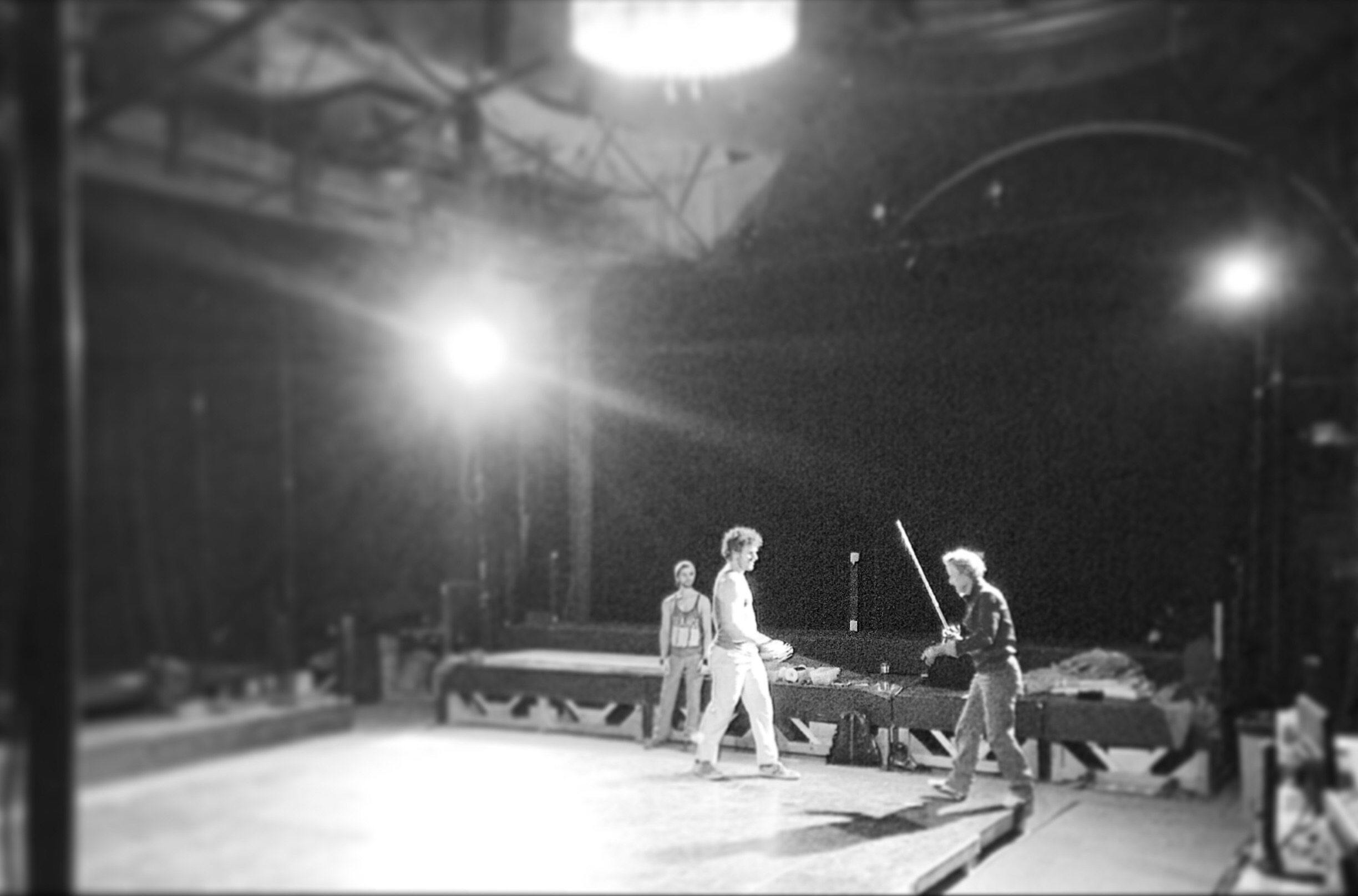 Ian Rose (far right) works with J. Connor Hammond and Ken Sandberg on the Musketeer stage