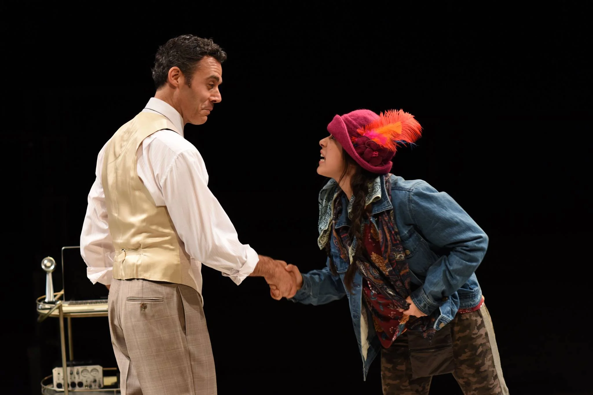 Gregory Isaac as "Higgins" and Leigha Kato as "Eliza". Photo by Shawn May.