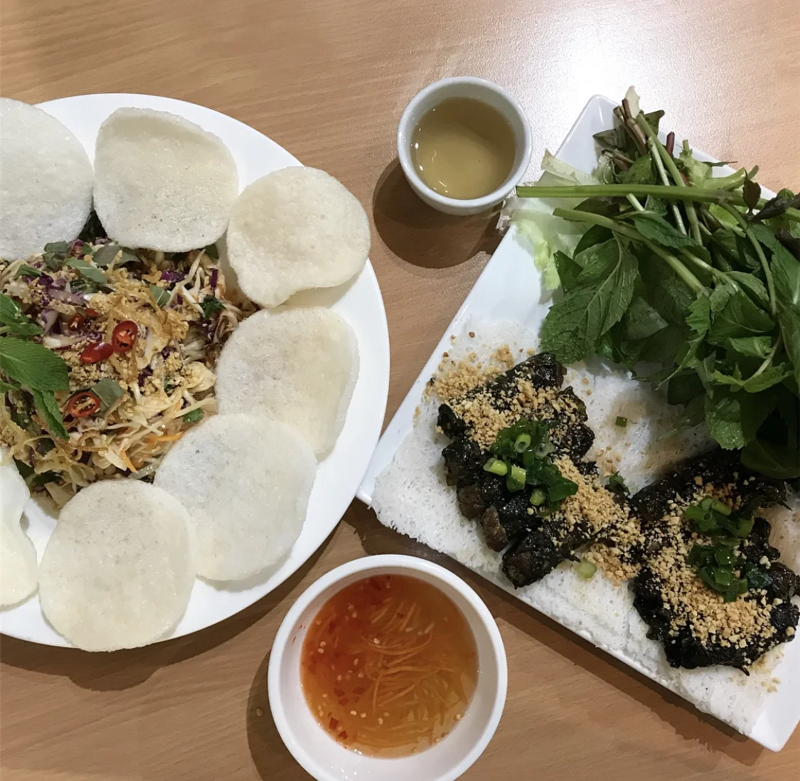 L-R: Goi ga (Vietnamese chicken coleslaw) and bo ba lot (beef wrapped in betel leaves), My Tho, Preston.