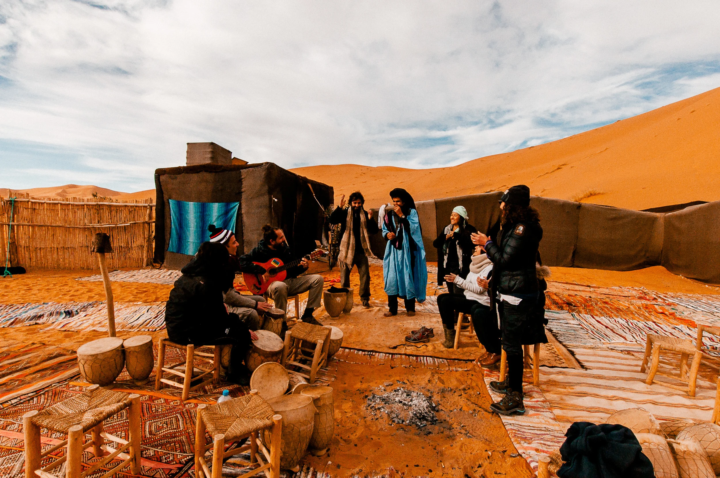 The gang jamming to some music before riding back to Merzouga.