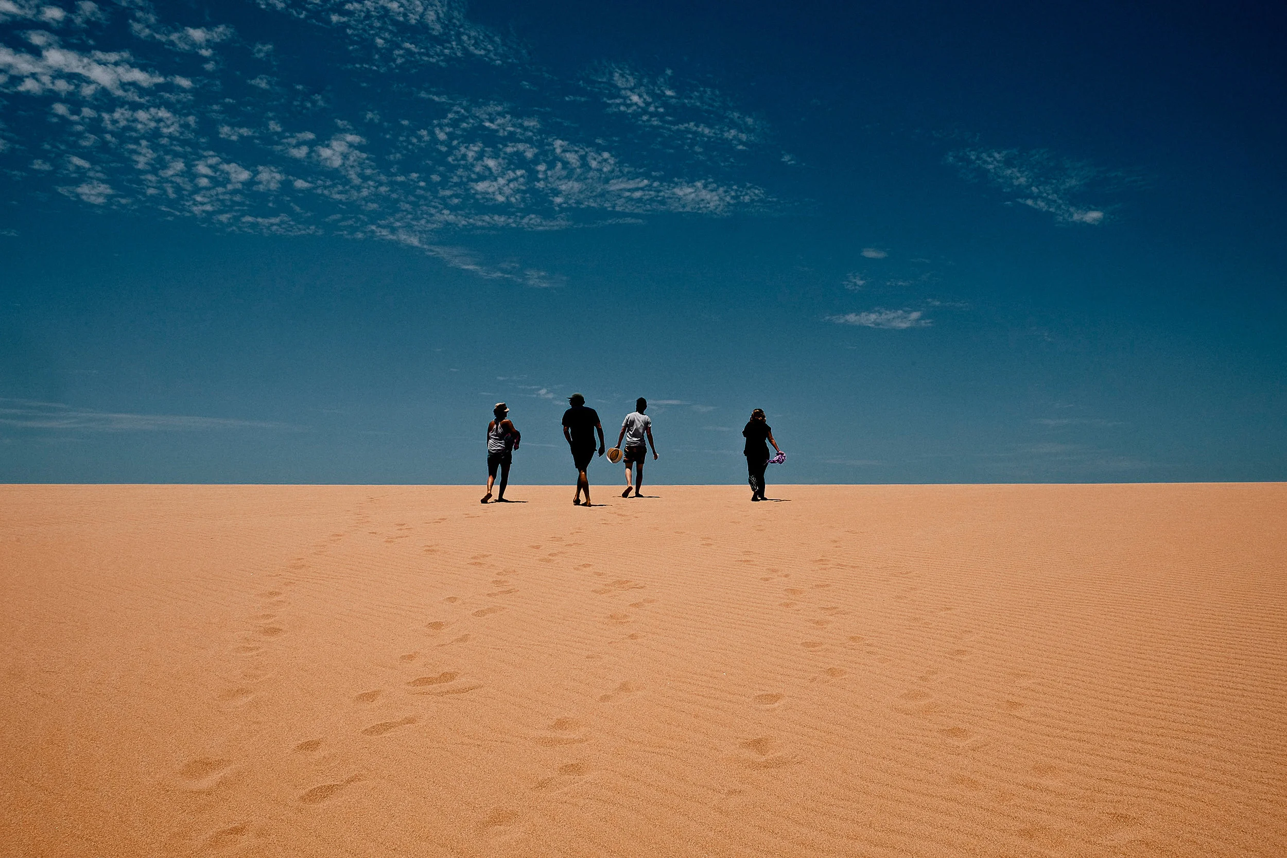 Climbing over the massive Taroa Dunes, we were not prepared to see the ocean on the other side.