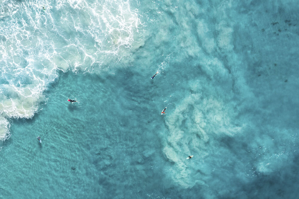 Surfers and Waves Aerial Drone View