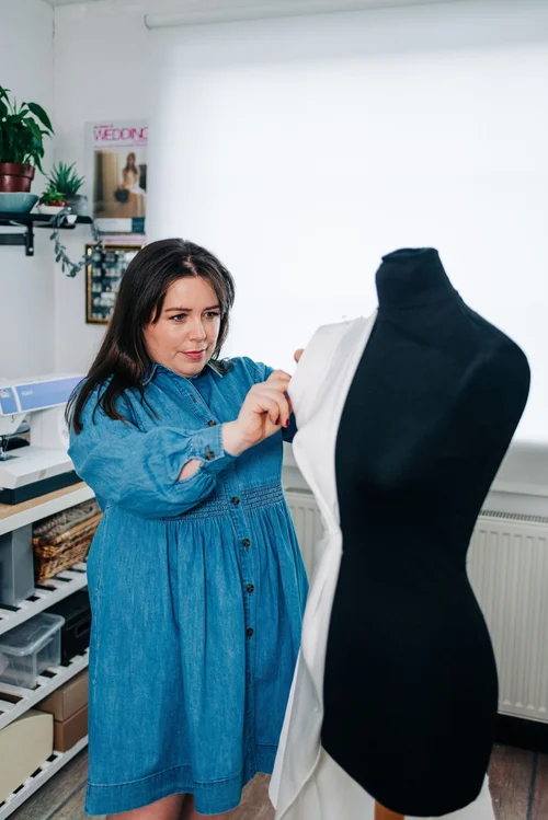 personal dress designer Fashion Designer Designing Clothes In Her Fashion Design Studio Photo (140560)