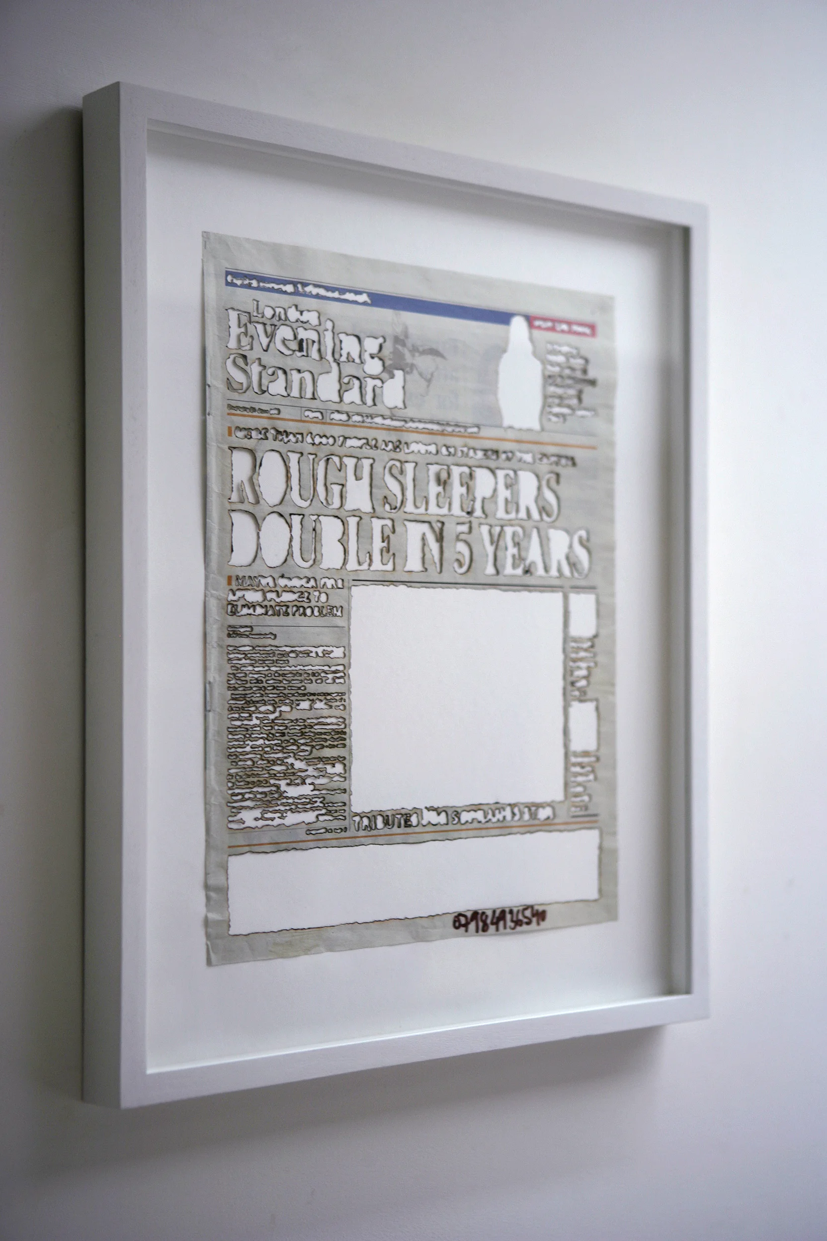 The following newspaper pages have been exposed to the physical process of sunlight passing through the lens, recording reality, but with the intention of removing all content from the newspaper pages. The condensed ray of light produced by the lens picks out the black ink and destroys it. Paradoxically, it is not the light which portrays the news but rather the social structure in which it is drawn.