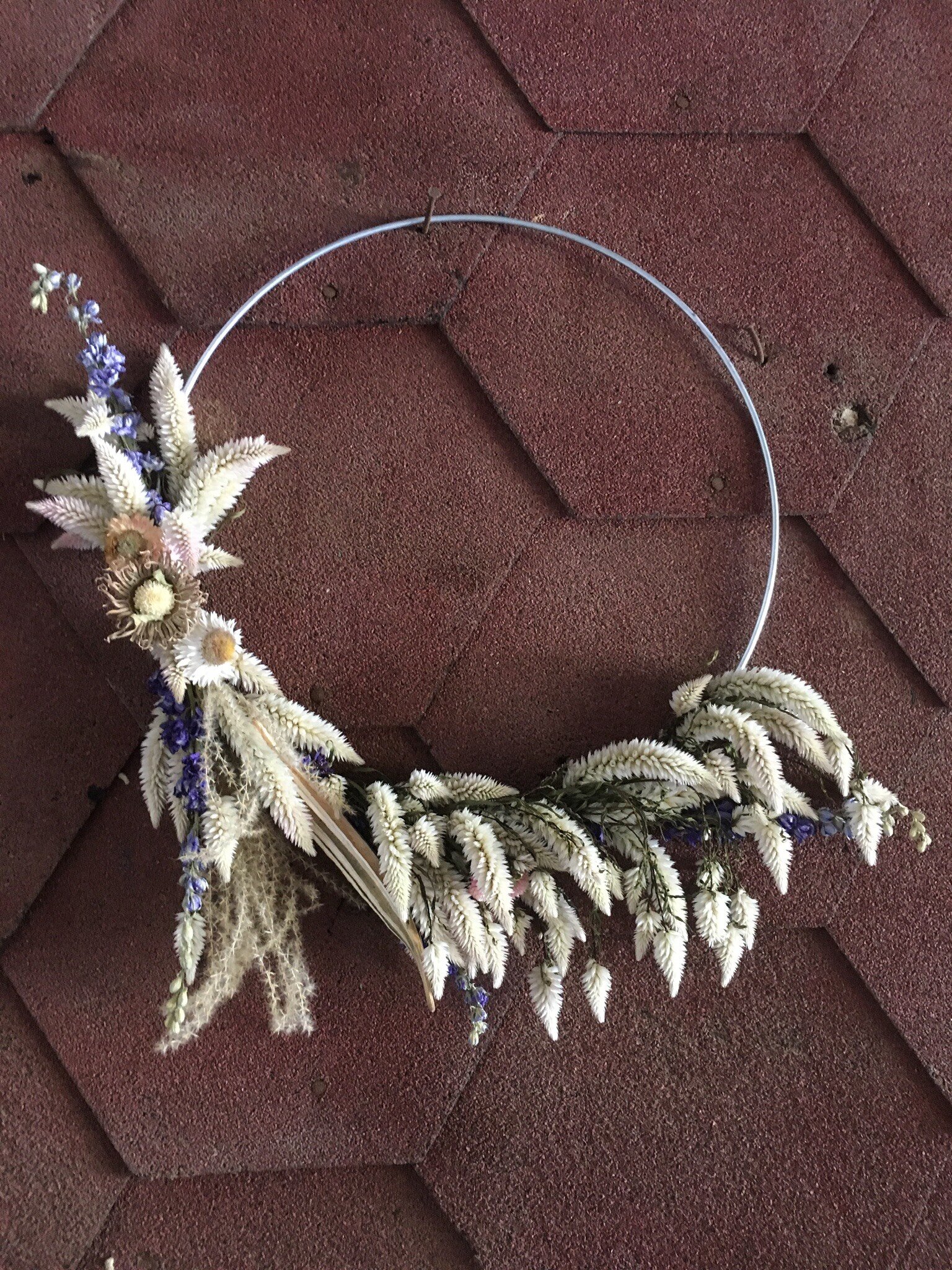 We dried a lot of flowers this year, and with the slower days, we’ve had time to begin work on Autumn wreaths! We’ll be bringing a few to market this weekend, and will have more available in the weeks to come. We’re excited to share them with you!