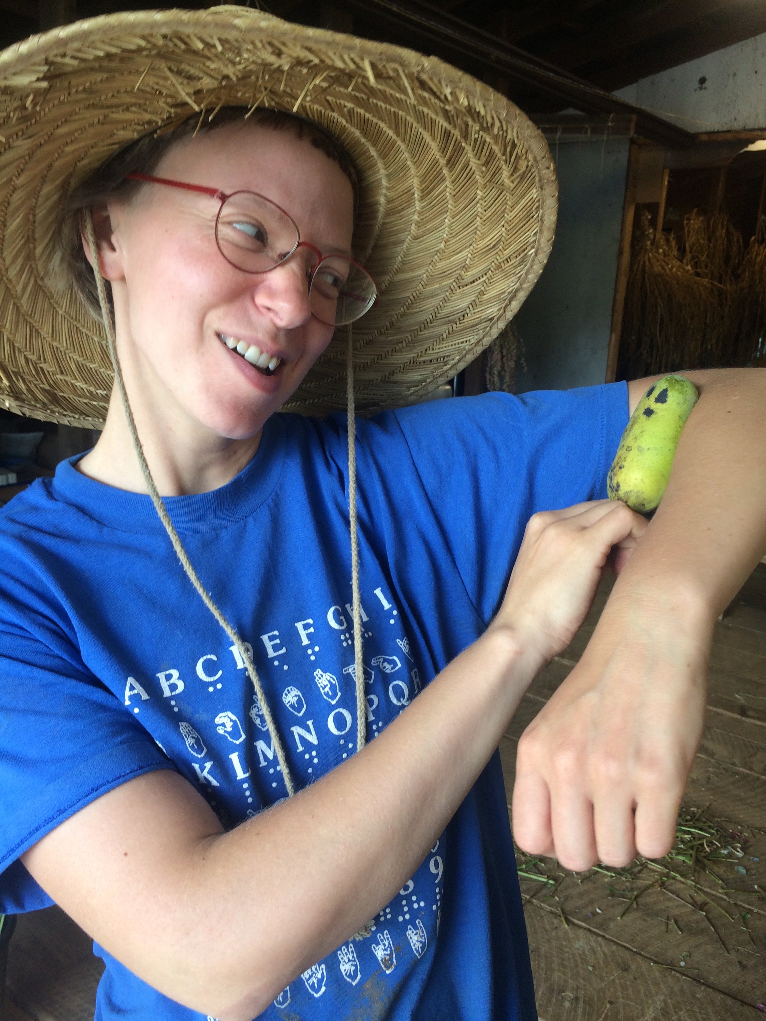 Amelia P cradles an expressive pawpaw, 2018