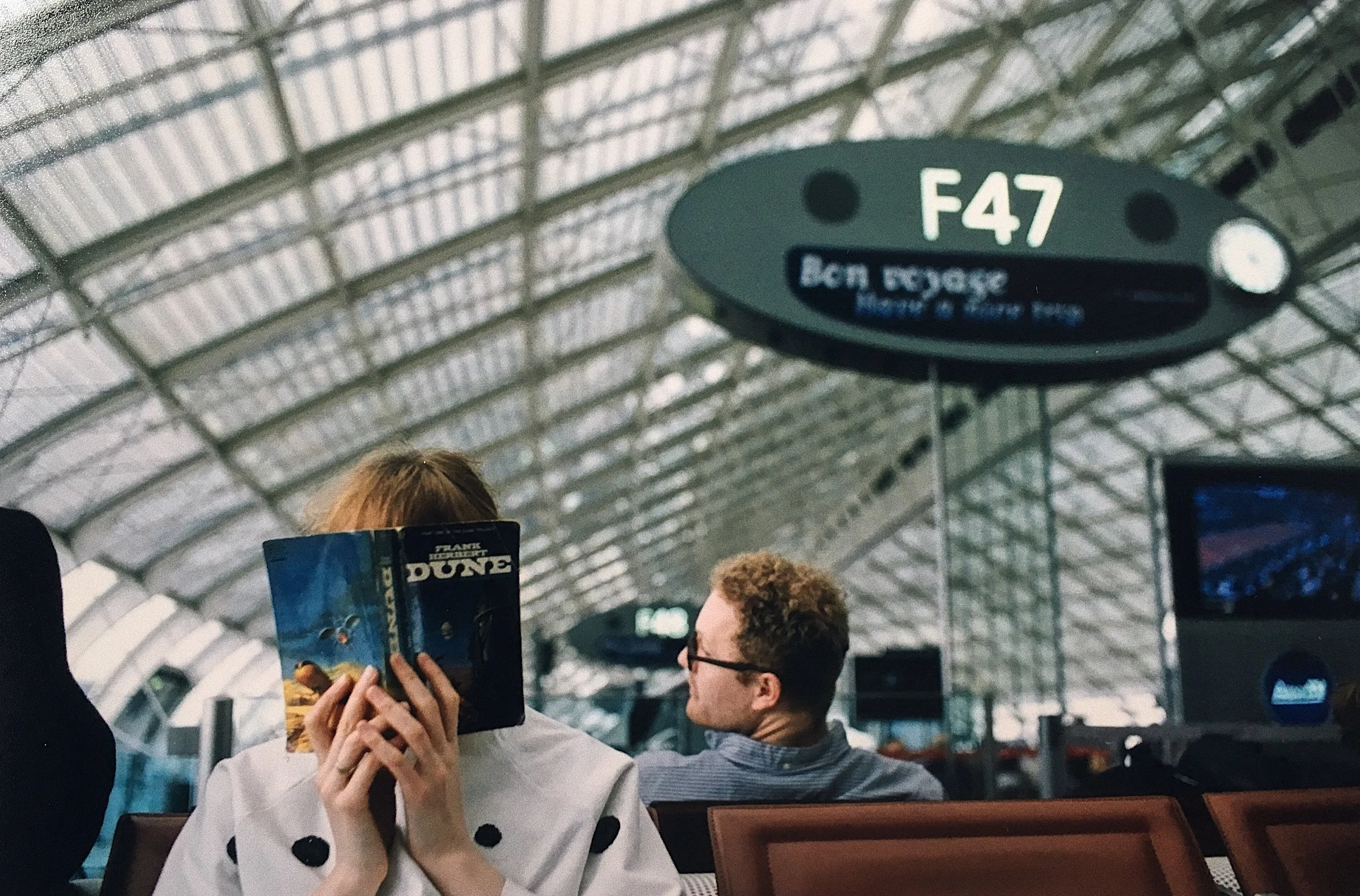  Gus reading Dune, airport in Paris /// 2016 /// 35mm 