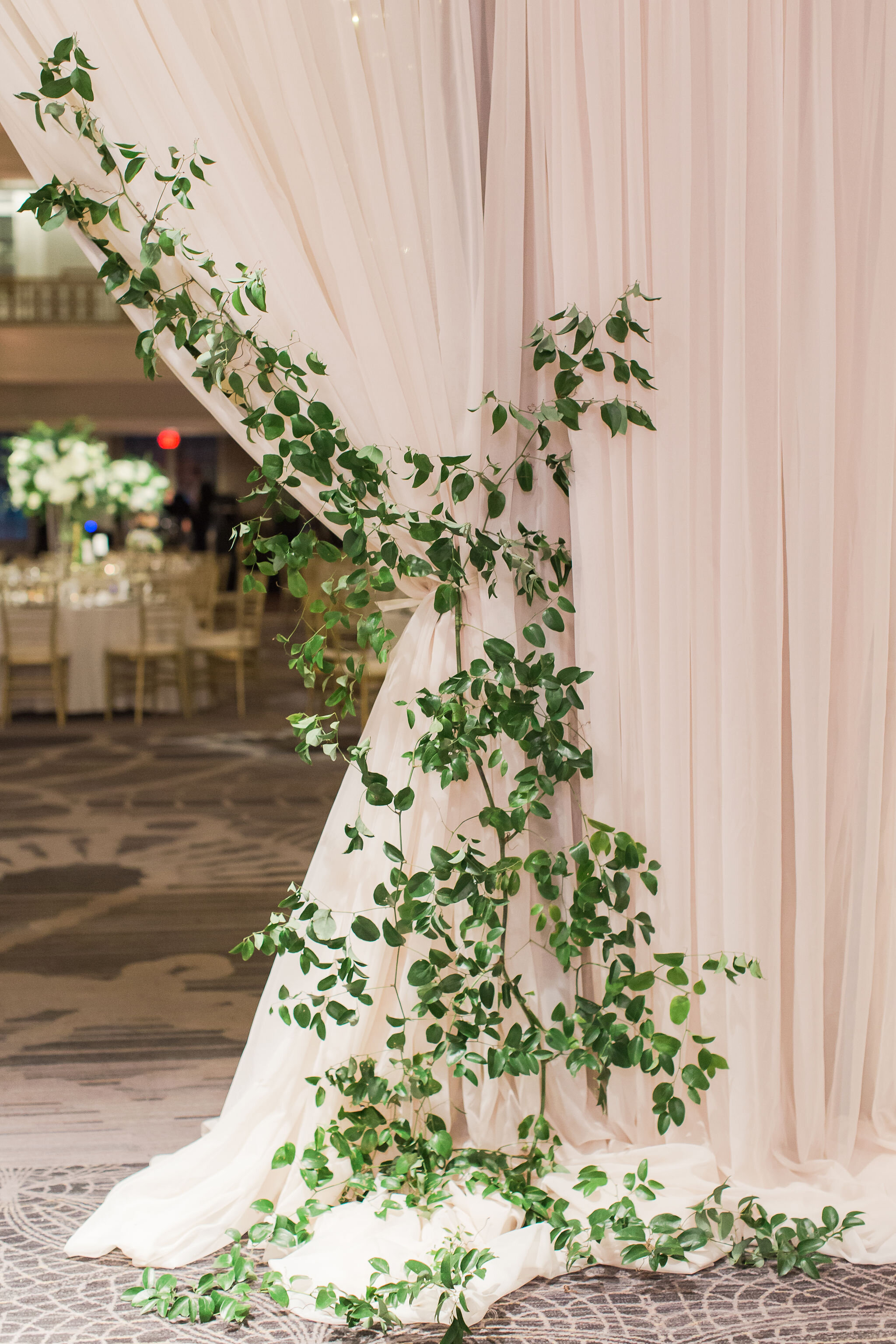 White Draping with Greenery