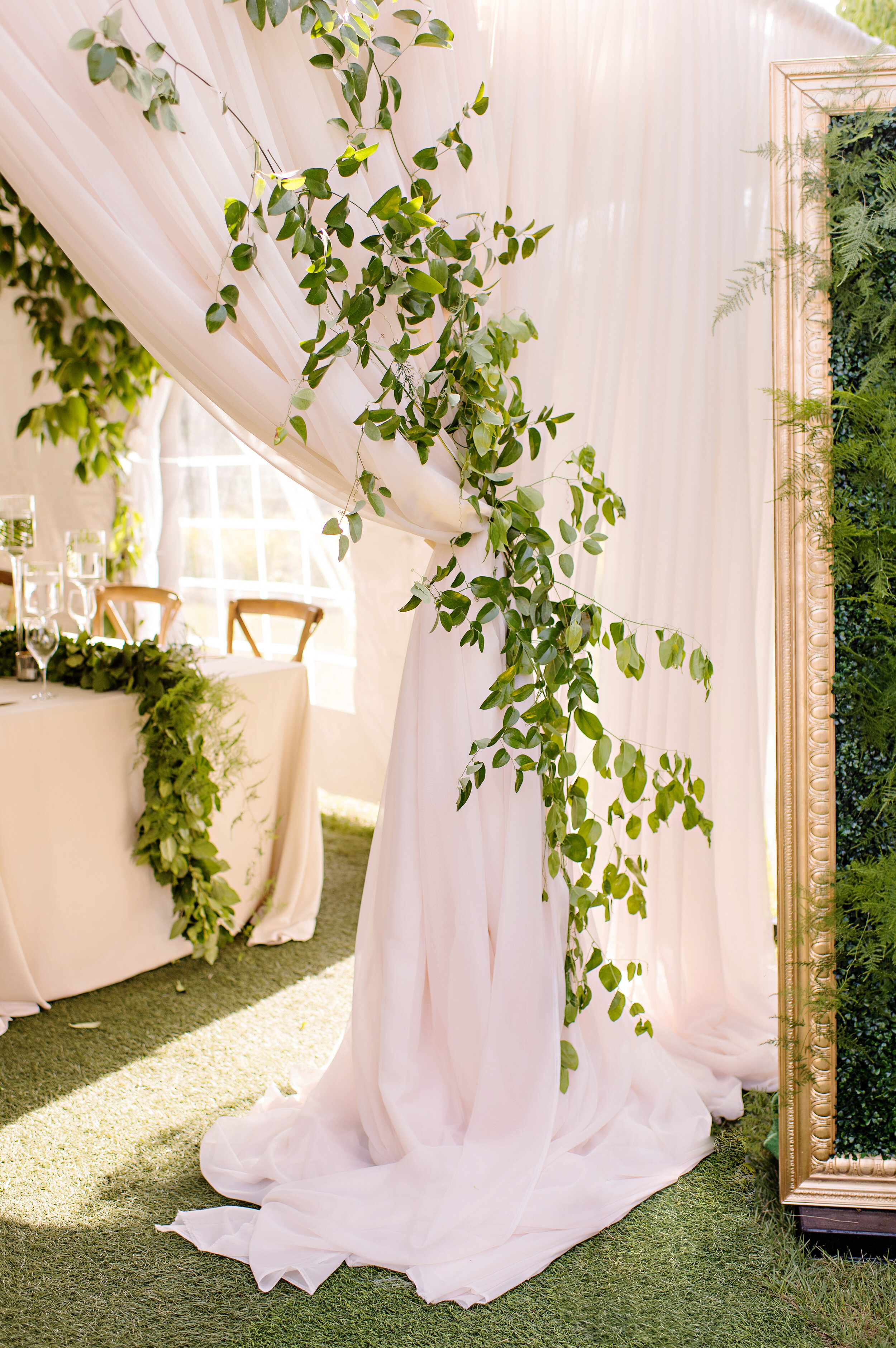 White Draping with Greenery