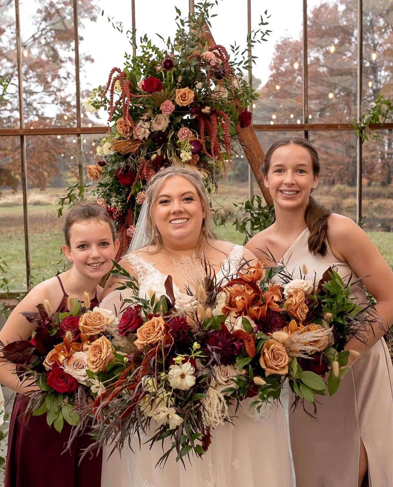 A breathtaking bouquet and flower arrangements featuring butterfly ranunculus, orchids, dahlias, and pampas grass, tailored perfectly for this enchanting wedding affair!⁠
&bull;⁠
&bull;⁠
&bull;⁠
&bull;⁠
| Floral &amp; Event Design: @clflorals |⁠
| Ph