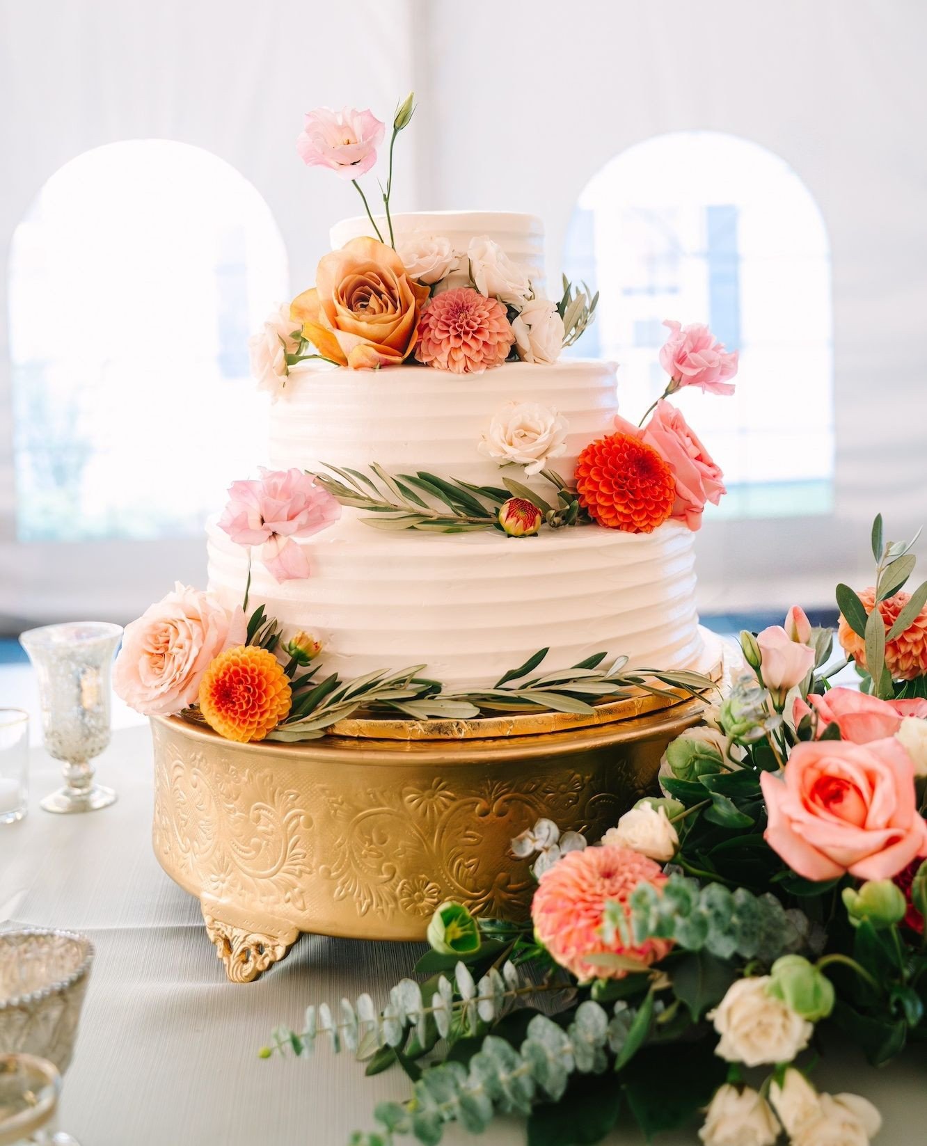 A slice of beauty. The florals didn&rsquo;t stop at the tables&mdash;how perfect is this sweet little cake? Caroline &amp; Kendall&rsquo;s floral-adorned confection was just as stunning as the rest of their day.⁠. ⁠
⁠
Vendor Team⁠
Photographer: @brit