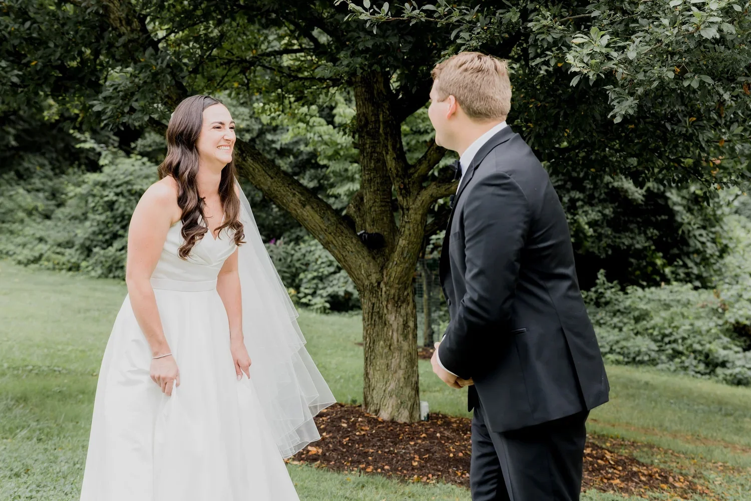 Joyful First Look Under the Trees