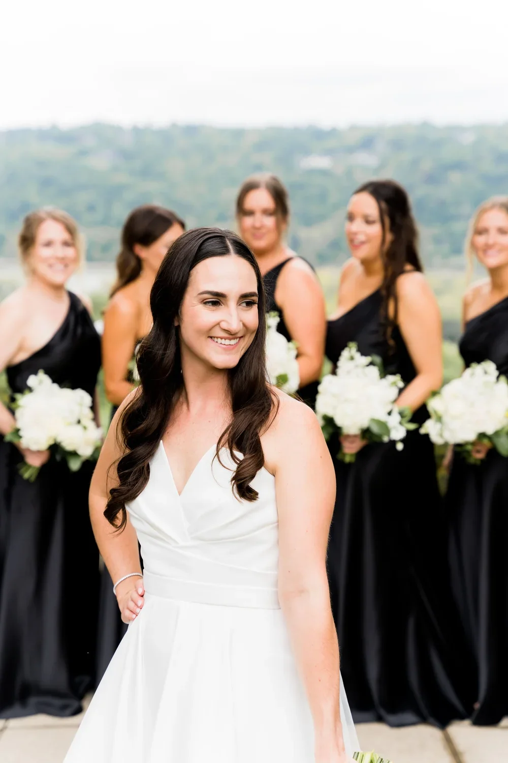 Bridal Portrait Surrounded by Bridesmaids
