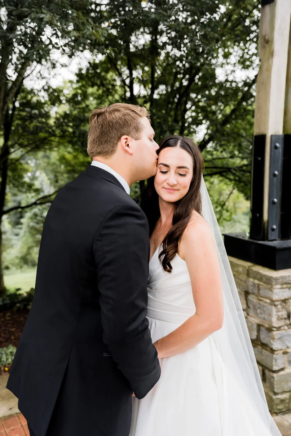 Groom’s Kiss on Bride’s Forehead