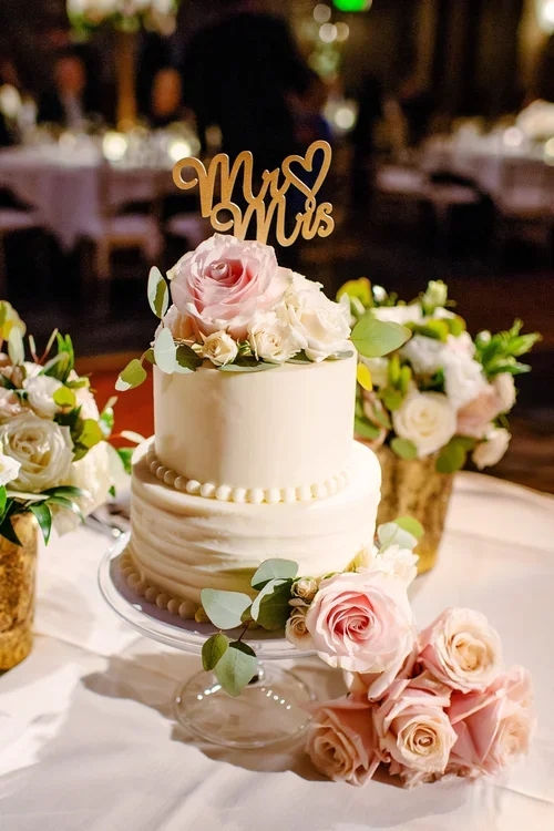 Romantic Wedding Cake with Pink Rose Accents