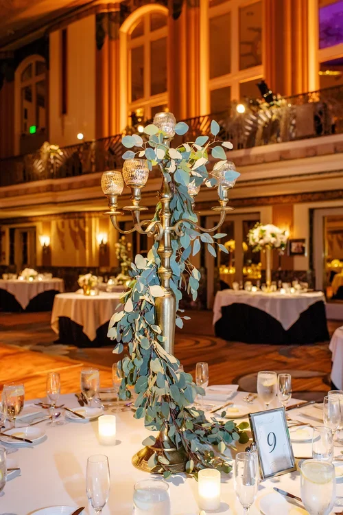 Gold Candelabra with Hanging Glass Globes at Hilton Netherland Plaza Reception