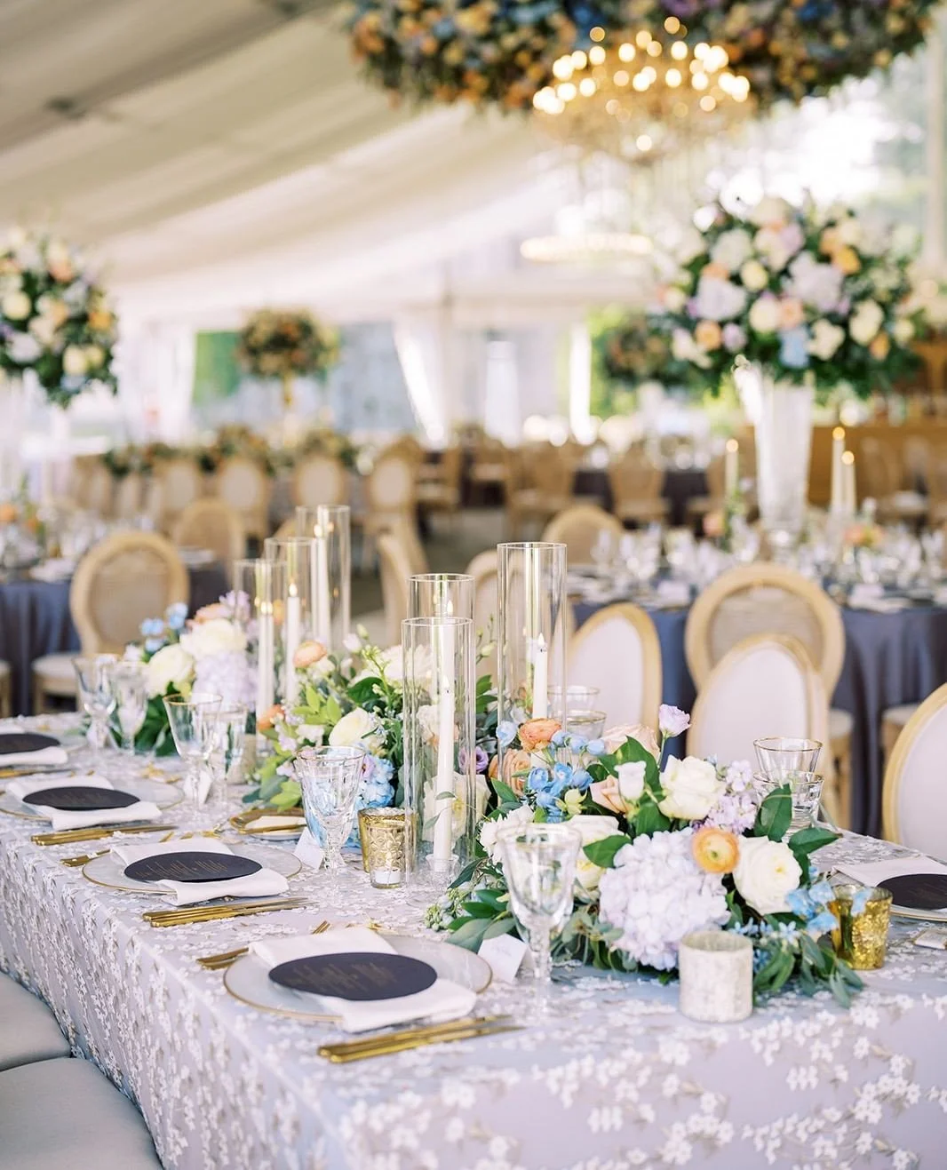 Designing these tablescapes for Stefanie and Daniel was such a joy. From the lavender linens to the candlelight and lush florals, every detail came together to create a timeless and romantic atmosphere.⁠
⁠
Vendor Team⁠
Photographer: @laurenleephotogr