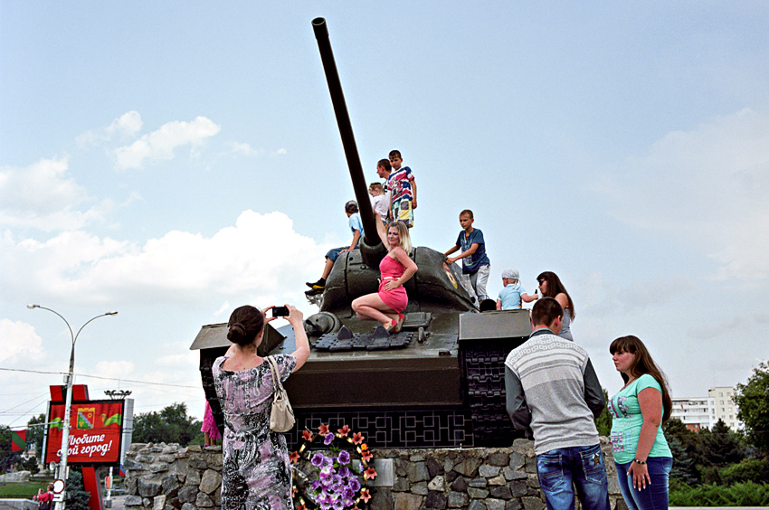 Locals pose on a Tank, Tiraspol. Transnistrian indepedance day. 