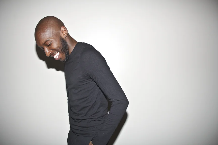 Marcus Donaldson on left, looking down, smiling