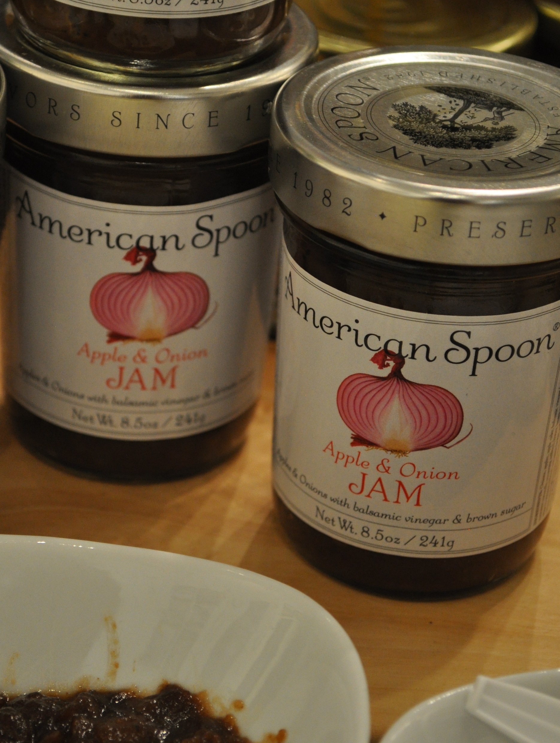 American Spoon's Apple and Onion Jam bursts with savory, sweet and tart flavors. Great to accompany a sharp cheddar cheese, or to turn your chicken or pork up a notch. 