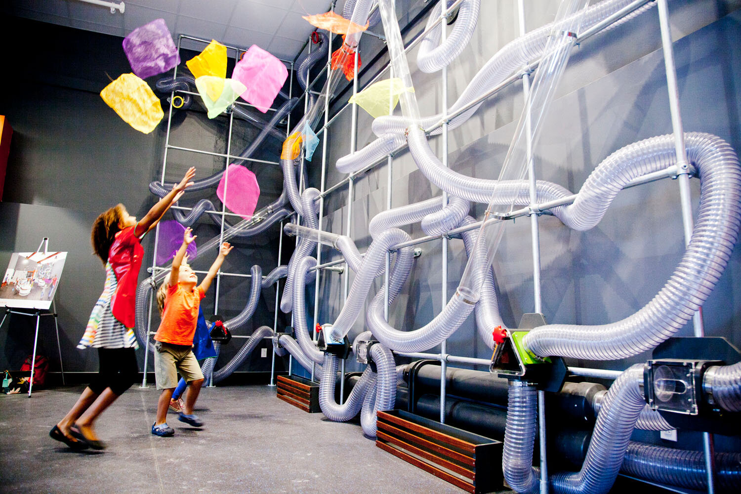 Children_Fascinated_by_Scarf_Air_Maze_at_the_Wonder_Lab_in_Childrens_Museum_of_Cleveland.jpg