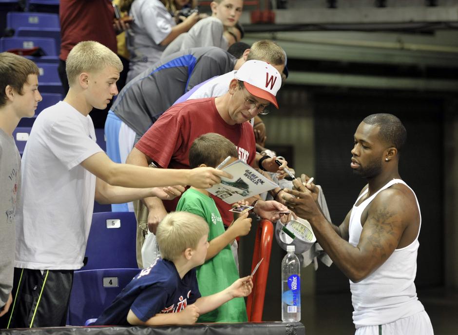 Jamal Crawford A PLUS Classic - Rodney Stuckey with Fans.jpg